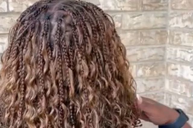 Passion Twists by Crowned by Marco Hair Braiding in Arlington, Texas