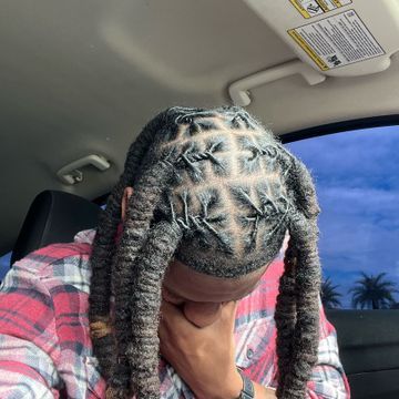 Loc retwist by The Giselle Brand in Houston, Texas