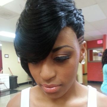Traditional sew-in (leave out) by G' Spot Beauty Bistro in Memphis, Tennessee