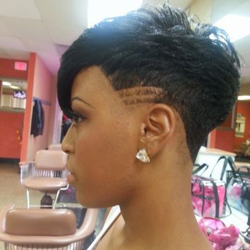 Traditional sew-in (leave out) by G' Spot Beauty Bistro in Memphis, Tennessee