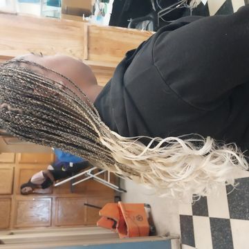 Sew in weave by Shikrat Hair Stylist in Denver, Colorado