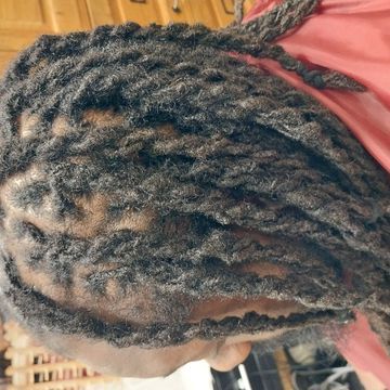 Sew in weave by Shikrat Hair Stylist in Denver, Colorado