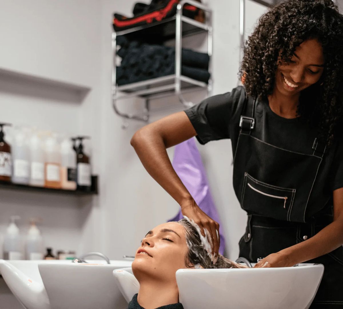Sew-in weave install by Juliana Afro Hair (inside Choppers Hair Salon) in Denver, Colorado