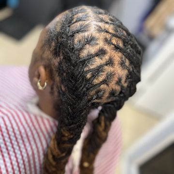 Sew-ins with minor leave out by Hair Genesis llc in San Antonio, Texas