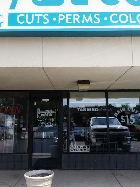 Fast Eddie's — sew-in stylist in South Bend, Indiana
