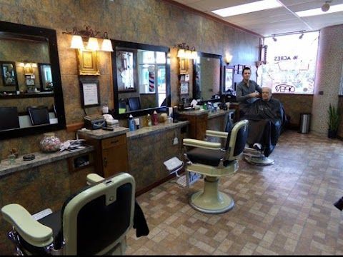 16 Acres BarberShop — sew-in stylist in Springfield, Massachusetts