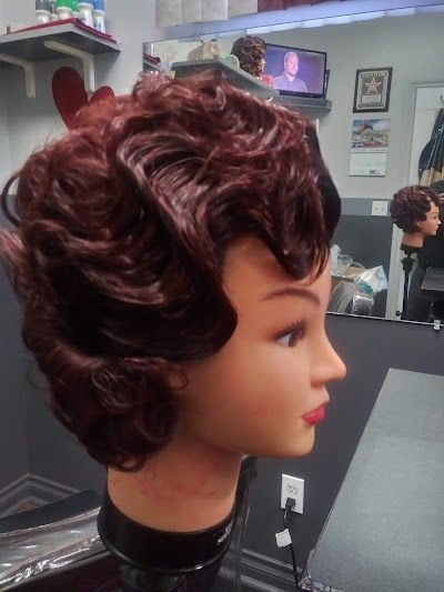 Exquizit Hair Suites — sew-in stylist in Flint, Michigan